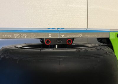 The Onewheel GT wiring harness retainer.